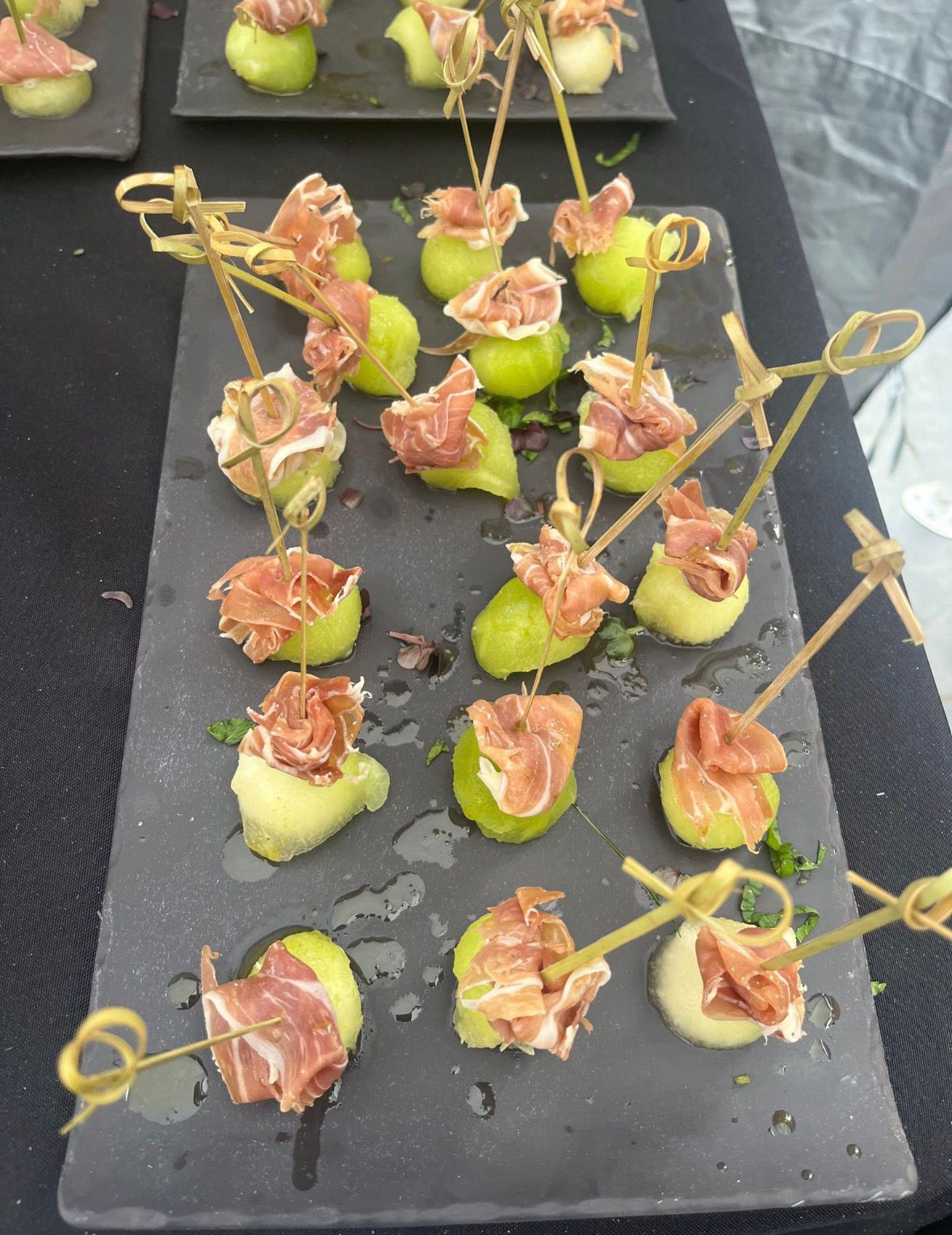 Prosciutto-wrapped melon canapés